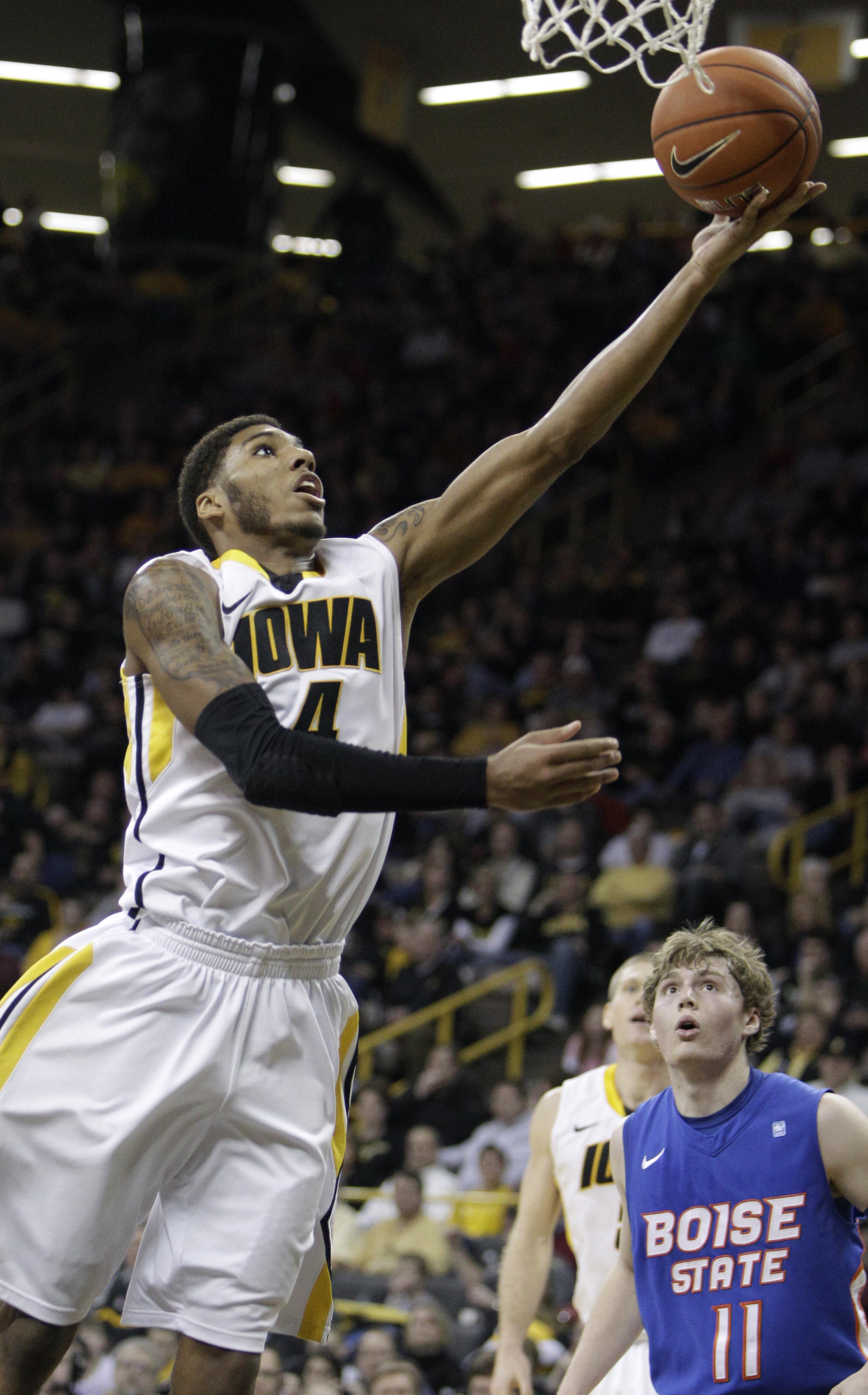 Marble leads the fast-paced Hawkeyes attack. (AP Photo/Charlie Neibergall)