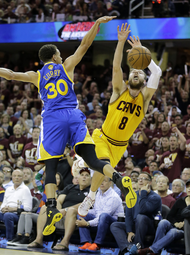 Of course, Curry was called for the foul here. (AP Photo/Tony Dejak)