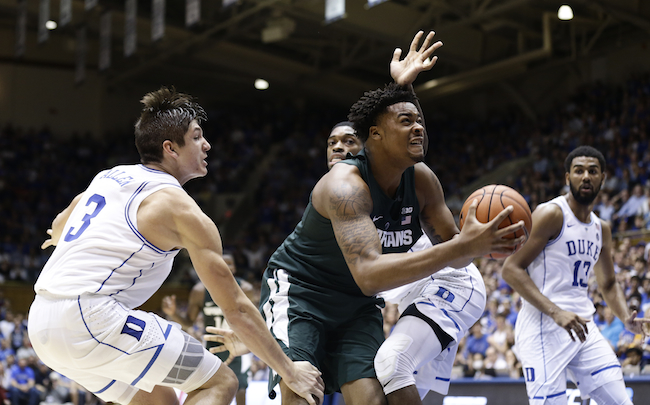 Duke's Grayson Allen, left, and Amile Jefferson defend against Michigan State's Nick Ward during the second half of an NCAA college basketball game in Durham, N.C., Tuesday, Nov. 29, 2016. Duke won 78-69. (AP Photo/Gerry Broome)