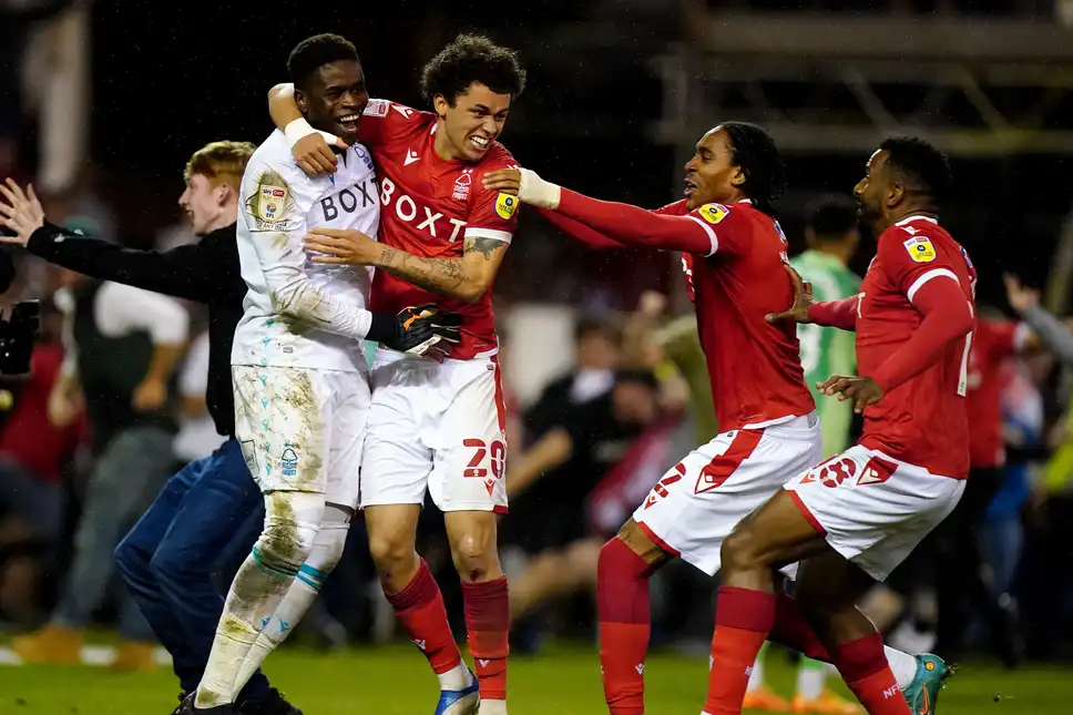 alt= "Nottingham Forest players celebrate"