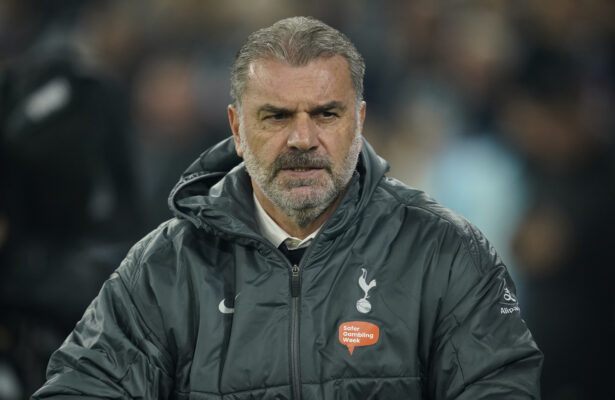 Tottenham's head coach Ange Postecoglou waits for the start of the English Premier League soccer match between Manchester City and Tottenham at the Etihad Stadium in Manchester, England, Sunday, Nov. 24, 2024. (AP Photo/Dave Thompson)